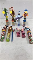 Lot of Disney battery operated candy toys, as