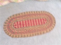 Small oval woven rug