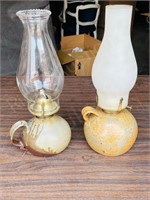 pair of stoneware base oil lamps