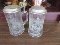Two etched steins