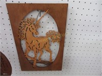 Carved wooden wall hanging by Dennis Atkins