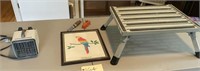 Step stool, small electric heater, framed picture.