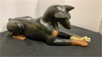 Doberman dog figurine, laying down ,  17 inches