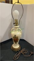 Vintage ceramic table lamp decorated in roses.
