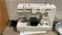 White Singer sewing machine with