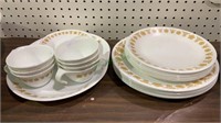 32 pieces of Corelle dinnerware - coffee cups,