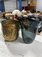 (2) Floor vases 
1 brass 
1 glass