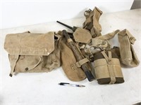 WWII pack with shovel, tools, canteen, mess items