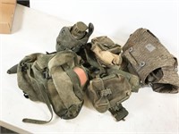 military canvas pack with canteen, knife scabbard