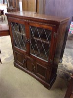 Cathedral Carved Dark Oak Leaded Glass Bookcase