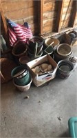 Box full of shells & flower pots and flags