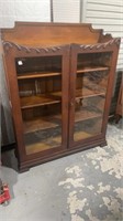 Oak Two Door Bookcase with Carving