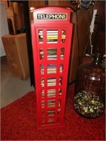 telephone booth cd holder with assorted CDs