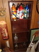 shelf with bottles and water bottles