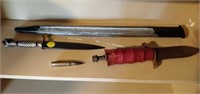 lot of swords, bullet and sheath