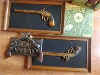 Winchester tin sign and gun signs