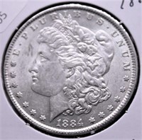 1884 MORGAN DOLLAR AU