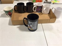 Mickey mouse coffee mug  and a few others