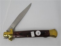 Large wild turkey folding knife. Measures: 8-1/4"