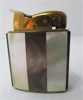 Evans vintage lighter with mother of pearl inlay.