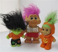 Assortment of Troll dolls. Largest measures: 7"H.