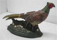 Cast iron pheasant door stop. Measures: 10"H.