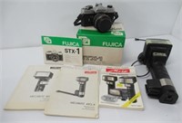 Metz45CL-4 camera flash and FUJI camera in box.