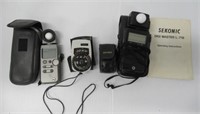 Group of camera flashes. Includes Sekonic.