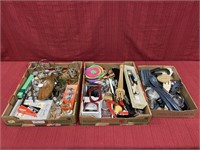 Two boxes of assorted kitchen utensils, candles,