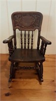ANTIQUE CHILD'S PRESSBACK ROCKER WITH ARMS