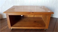 LOW PINE TABLE ON WHEELS