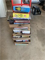 FIVE FLATS OF BOOKS AND VHS TAPES