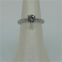 Ladies platinum diamond engagement ring round cent