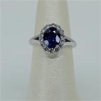 Ladies platinum blue sapphire diamond ring center