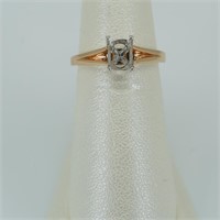 14kt pink gold mounting with a 4 prong platinum