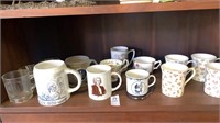 Large lot of designed mugs