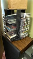 Swiveling CD holder with CDs