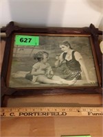 WOOD FRAMED YOUNG GIRLS SITTING IN FIELD PRINT
