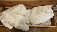 Contents of cedar chest  afghans and bed