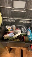 Plastic bin with office supplies