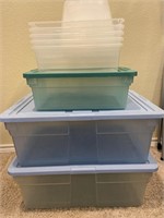 Lot of eight plastic bins with lids