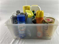 Plastic tote full of Household cleaning supplies
