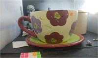 Giant coffee cup flower pot