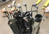 4 Golf Bags w/Assortment of Golf Clubs