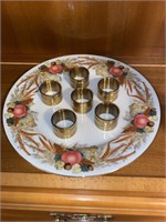 AUTUMN PLATE WITH HEAVY BRASS NAPKIN RINGS