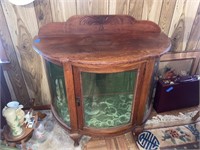 ANTIQUE ROUND GLASS OAK DISPLAY TABLE.