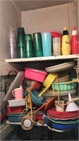 Two Shelves of Plastic Storage and Tupperware