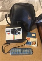 Polaroid Camera and Flashbulbs