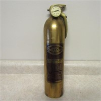 Vintage brass fire extinguisher. Quick Aid.
