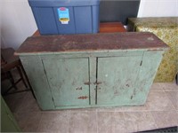 primitive wood green paint cabinet.